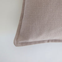 Mauve cotton cushion with oxford edging