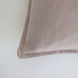 Mauve cotton cushion with oxford edging