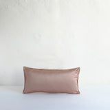 Muted pink satin cushion