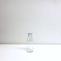 Milk bottle with lid