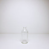 Milk bottle with plastic cap