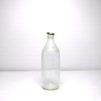 Milk bottle with metal cap