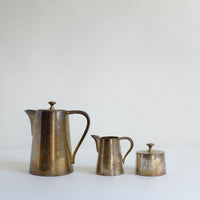 Silver teapot, creamer and sugar pot.