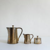 Silver teapot, creamer and sugar pot.