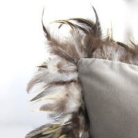 Feather trimmed velvet cushion