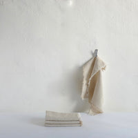 Natural linen napkin with fray edge