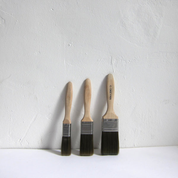 Wood paint brushes dark bristles