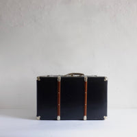 Navy suitcase with wood detail