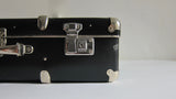 Navy suitcase with wood detail