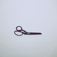 Matt black tailors makers scissors.