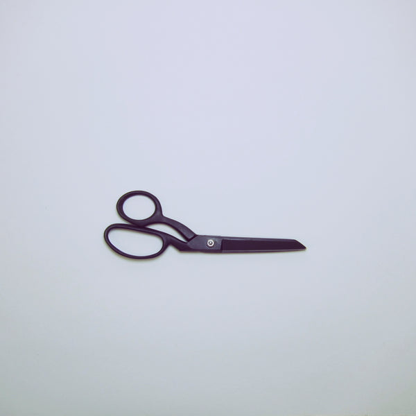 Matt black tailors makers scissors.