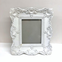 Ornate white resin frame