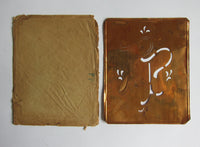 Vintage box of various stencils