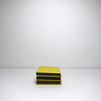 Set of 3 vintage yellow books