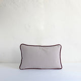 Pale grey cotton cushion with piping