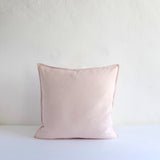 Pale pink cotton cushion