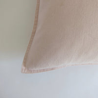 Pale pink cotton cushion
