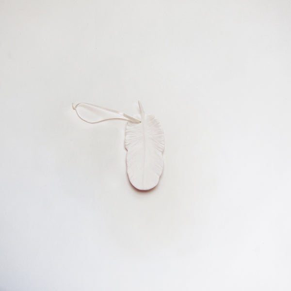 Short porcelain feather