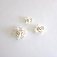 Porcelain wall hung flowers