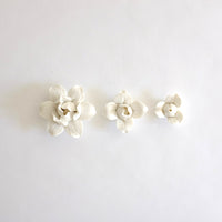 Porcelain wall hung flowers