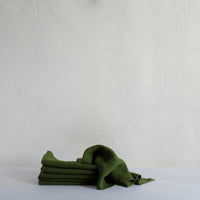 Raw edge heavy olive linen napkin