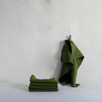 Raw edge heavy olive linen napkin