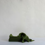 Raw edge heavy olive linen napkin