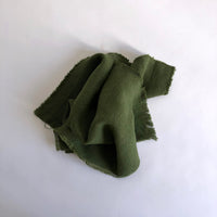Raw edge heavy olive linen napkin