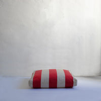 Red striped floor cushion