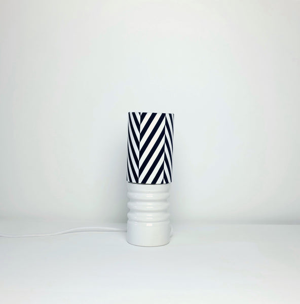 Midcentury white ceramic lamp with zigzag shade