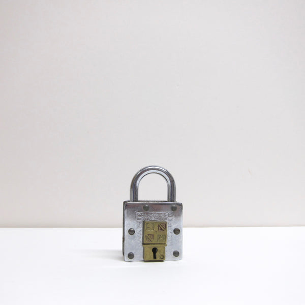 Silver square padlock