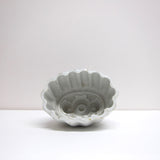 Vintage scalloped ceramic jelly mould