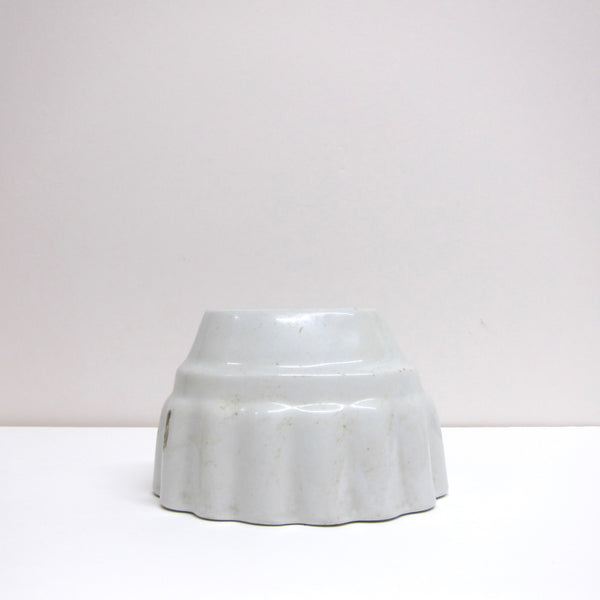 Vintage scalloped ceramic jelly mould