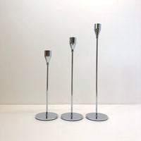 Set of three silver candle holder