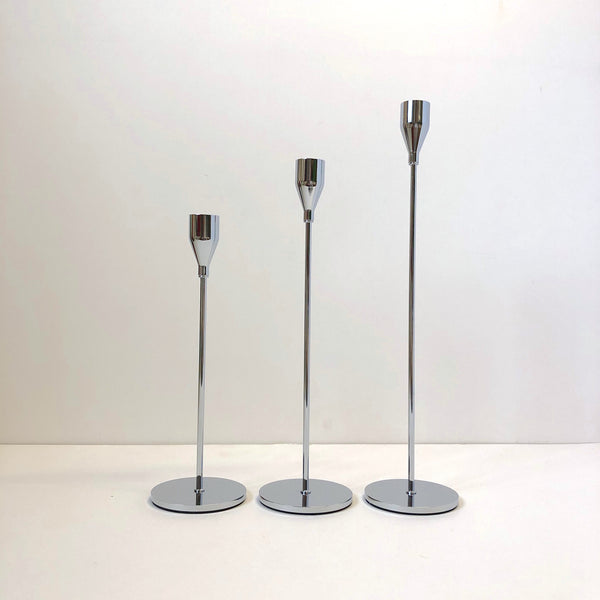 Set of three silver candle holder