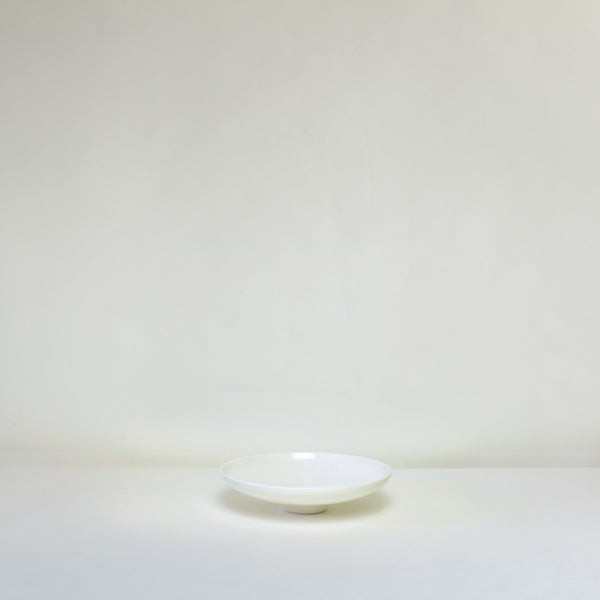 Shallow white ceramic bowl