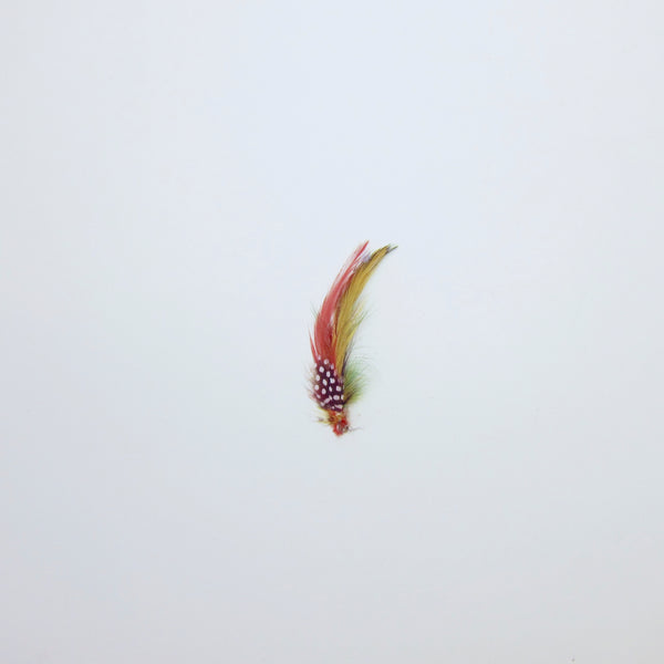 Small red tie of feathers