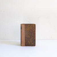 Set of 3 small brown vintage books