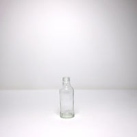 Stumpy glass milk bottle