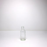 Stumpy glass milk bottle