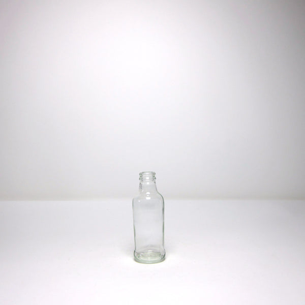 Stumpy glass milk bottle