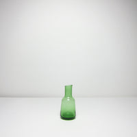 Small green glass vase