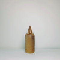 Spout neck clay bottle