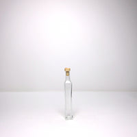 Tall thin bottle with cork stopper