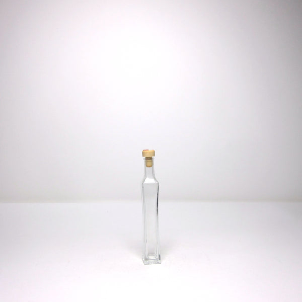 Tall thin bottle with cork stopper