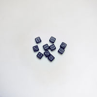 Ten black bakelite dice