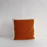 Terracotta stitched square cushion