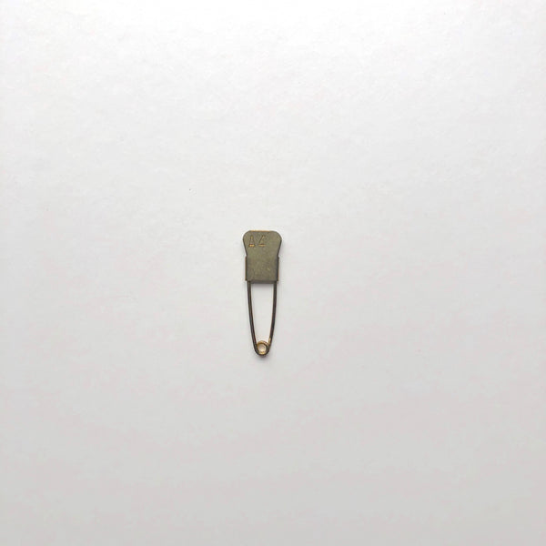Tiny A4 brass pin