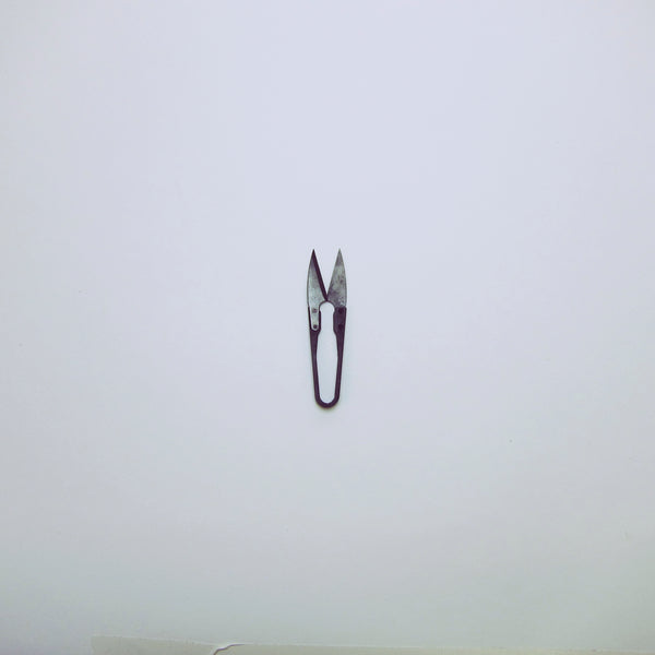 Small matt black snips.