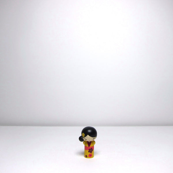 Small ceramic Japanese doll